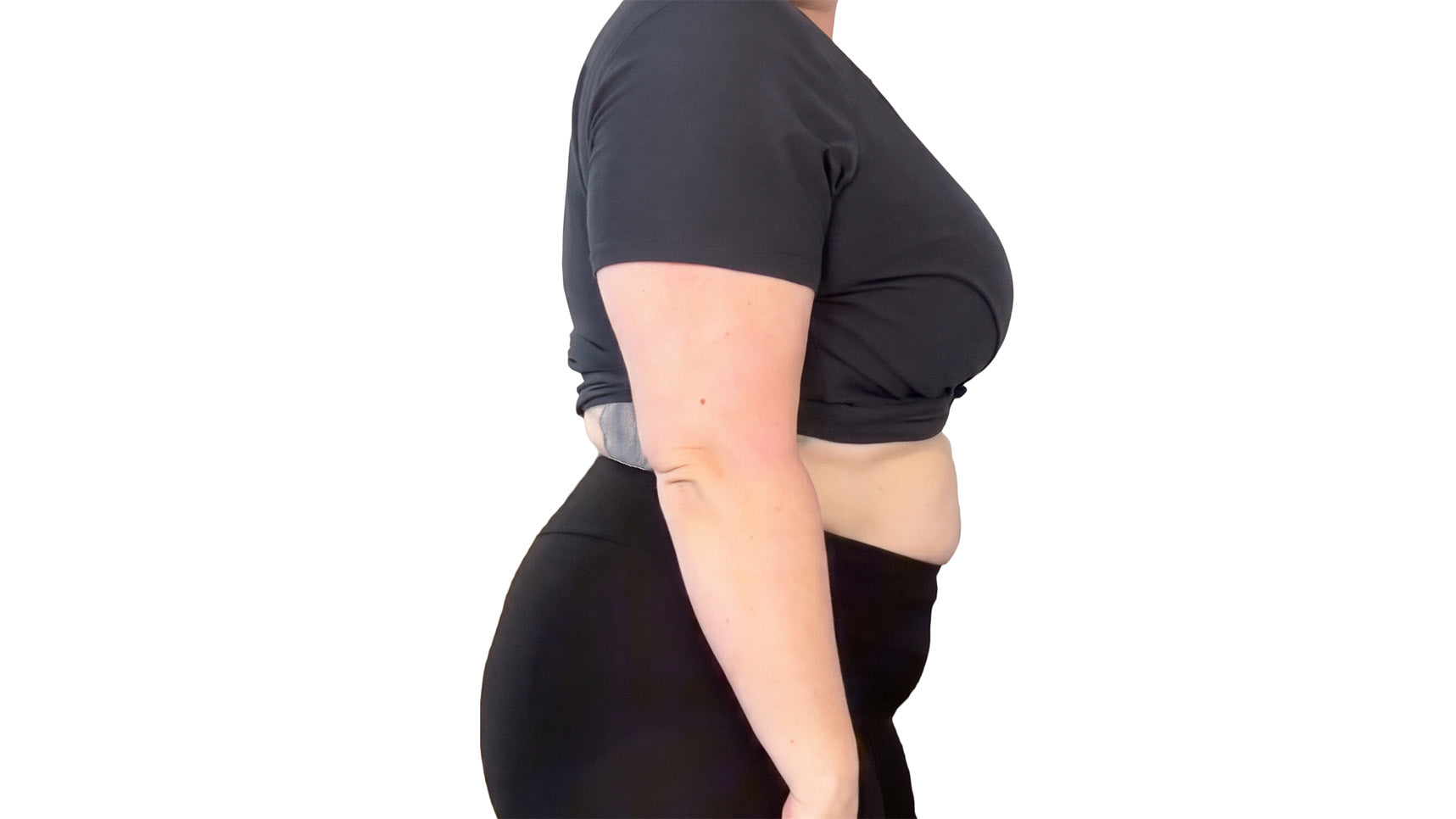 Person wearing a black outfit on a white background