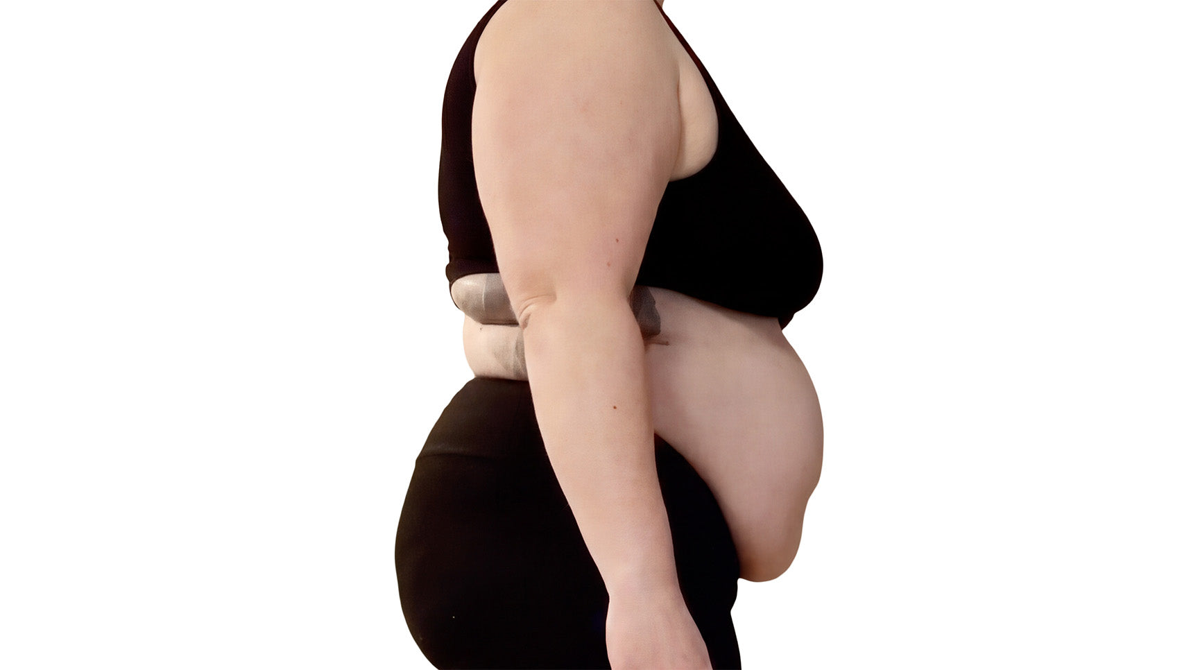 Pregnant woman wearing a black dress on a white background