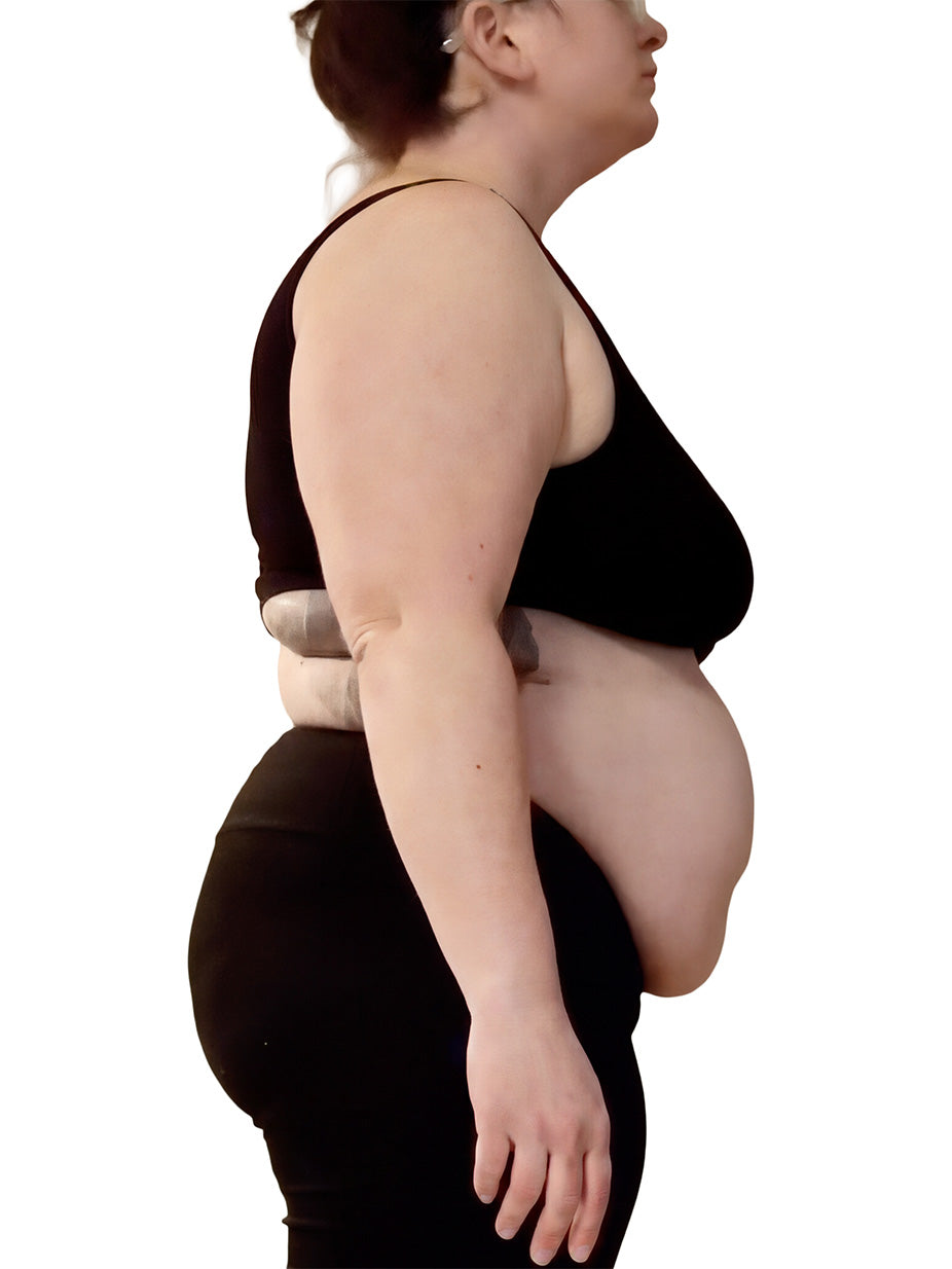 Person wearing a black outfit with a white background
